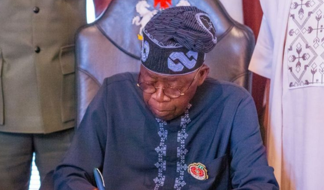 Tinubu Signs New Electoral Act 2026 into Law.